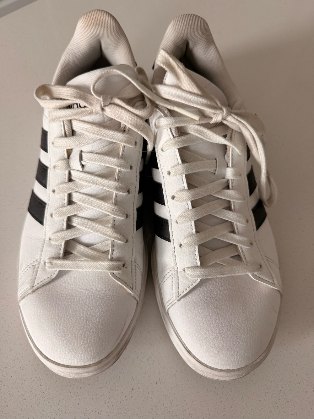 adidas White Sneakers with Black Three Stripes